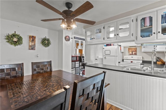 237 Creston, West Mifflin, PA 15122 - kitchen featuring white appliances, a ceiling fan, glass insert cabinets, and white cabinets