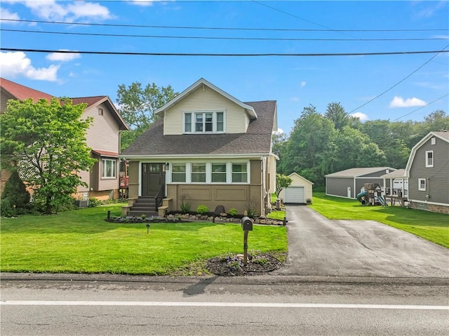 2026 Darlington Rd, Chippewa Twp, PA 15010 - bungalow-style house with an outdoor structure, a garage, a front lawn, and roof with shingles