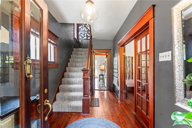 2026 Darlington Rd, Chippewa Twp, PA 15010 - foyer entrance with french doors, dark wood finished floors, and stairway