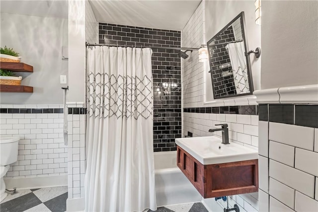 2026 Darlington Rd, Chippewa Twp, PA 15010 - full bath featuring tile walls, shower / bath combination with curtain, vanity, and a wainscoted wall