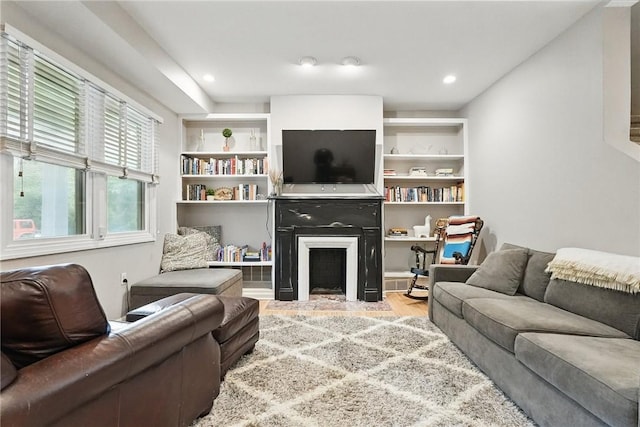 5727 Kentucky Ave, Shadyside, PA 15232 - living area with a fireplace with flush hearth and light wood-style flooring