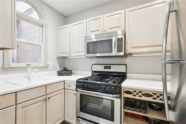 5727 Kentucky Ave, Shadyside, PA 15232 - kitchen with stainless steel appliances and light countertops