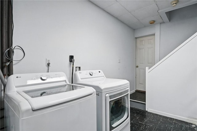 5727 Kentucky Ave, Shadyside, PA 15232 - washroom featuring washer and clothes dryer and dark flooring