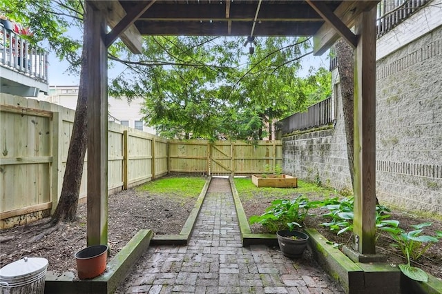 5727 Kentucky Ave, Shadyside, PA 15232 - fenced backyard featuring a vegetable garden