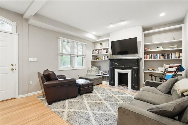 5727 Kentucky Ave, Shadyside, PA 15232 - living area with wood finished floors and a fireplace