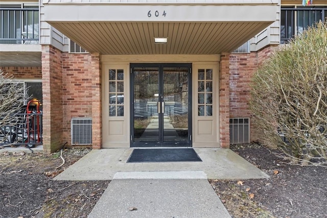 604 Calais Dr Unit 1203, Mccandless, PA 15237 - view of exterior entry with brick siding and french doors