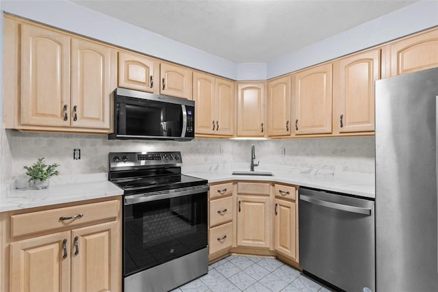 604 Calais Dr Unit 1203, Mccandless, PA 15237 - kitchen with appliances with stainless steel finishes, light brown cabinetry, light tile patterned floors, and decorative backsplash
