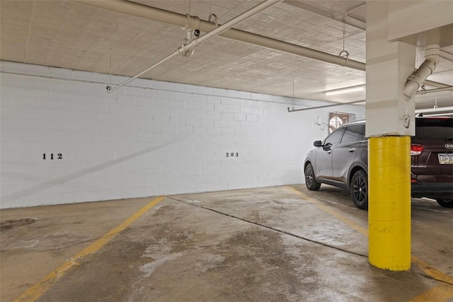 604 Calais Dr Unit 1203, Mccandless, PA 15237 - parking deck with concrete block wall