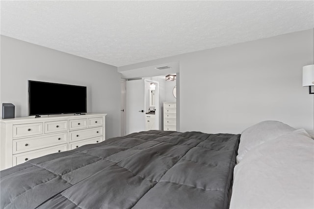 6013 Patrick Henry, Hopewell Twp Bea, PA 15001 - bedroom with a textured ceiling