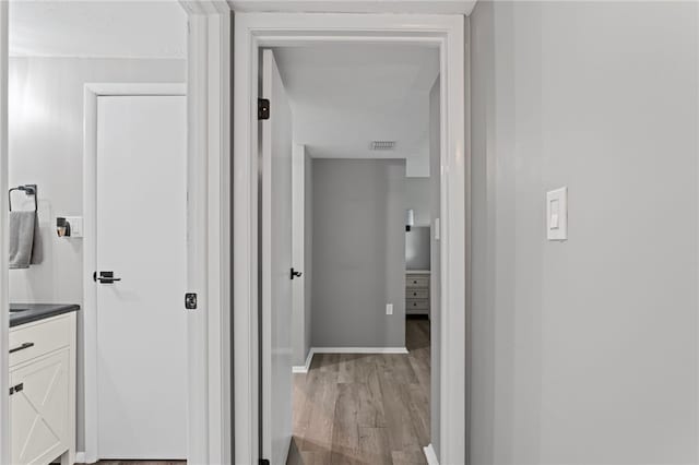6013 Patrick Henry, Hopewell Twp Bea, PA 15001 - hallway featuring wood finished floors and baseboards