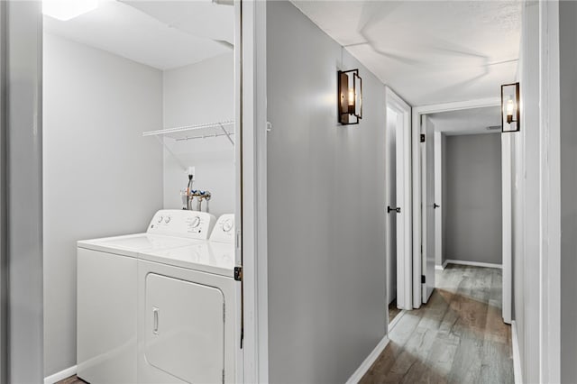 6013 Patrick Henry, Hopewell Twp Bea, PA 15001 - washroom featuring washer and dryer and wood finished floors