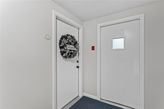 6013 Patrick Henry, Hopewell Twp Bea, PA 15001 - entryway with a textured ceiling and dark carpet