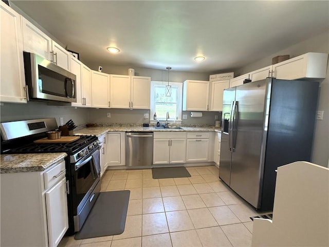 341 Deer Creek Rd, Clinton Twp, PA 16056 - kitchen with appliances with stainless steel finishes, light tile patterned floors, recessed lighting, white cabinets, and light stone countertops