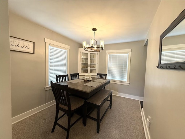 341 Deer Creek Rd, Clinton Twp, PA 16056 - dining space featuring a chandelier and baseboards