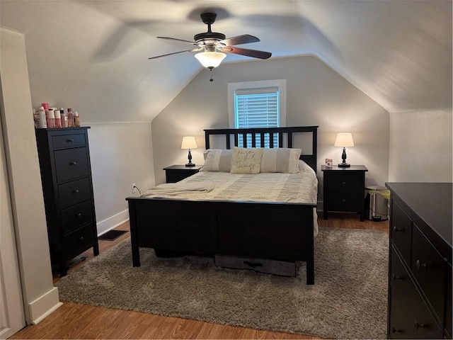 341 Deer Creek Rd, Clinton Twp, PA 16056 - bedroom featuring dark wood finished floors, vaulted ceiling, and a ceiling fan