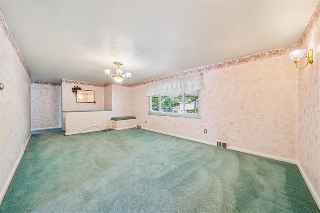 11 Frick Ave, Irwin, PA 15642 - spare room featuring a chandelier, carpet, and wallpapered walls