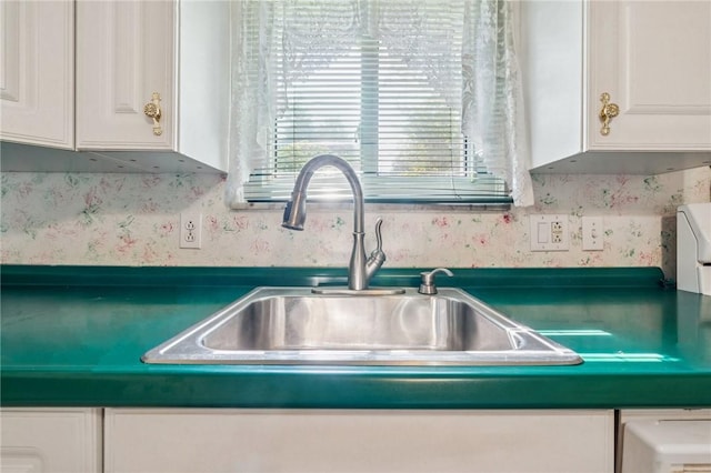 11 Frick Ave, Irwin, PA 15642 - detailed view of a sink and white cabinets
