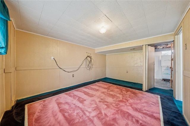 11 Frick Ave, Irwin, PA 15642 - unfurnished bedroom featuring crown molding, a decorative wall, and carpet floors