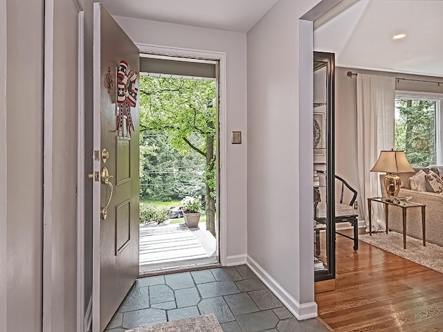 776 Elm Spring Rd, Mt Lebanon, PA 15243 - foyer with baseboards and stone finish floors
