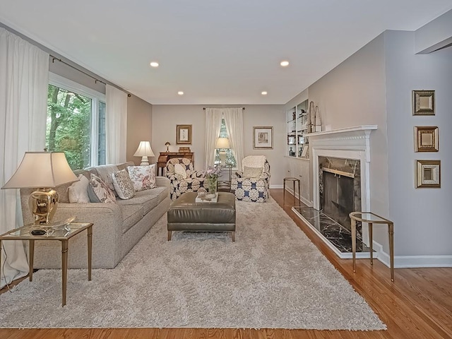 776 Elm Spring Rd, Mt Lebanon, PA 15243 - living area with wood finished floors, a fireplace, and recessed lighting
