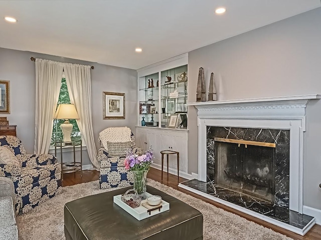 776 Elm Spring Rd, Mt Lebanon, PA 15243 - living room featuring wood finished floors, recessed lighting, and a fireplace