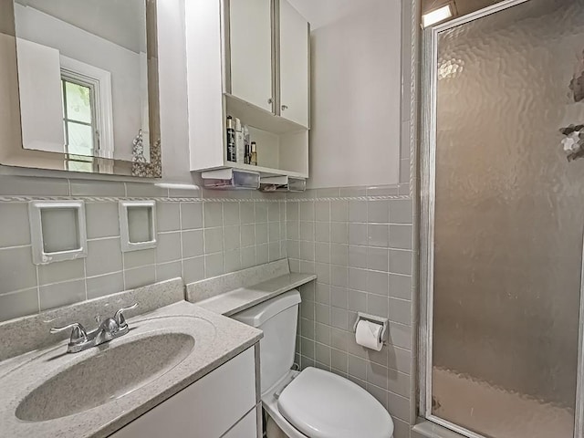 776 Elm Spring Rd, Mt Lebanon, PA 15243 - full bath with tile walls, a stall shower, vanity, and decorative backsplash