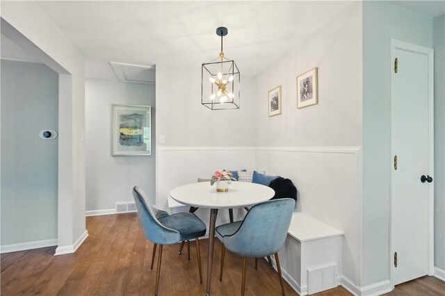 110 Simon Ave, Ross Twp, PA 15237 - dining area with wood finished floors and a chandelier
