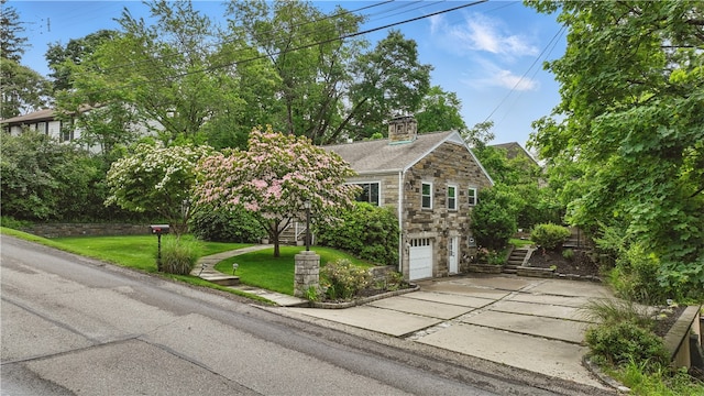 110 Simon Ave, Ross Twp, PA 15237 - view of front of home featuring stone siding, stairs, driveway, a garage, and a chimney