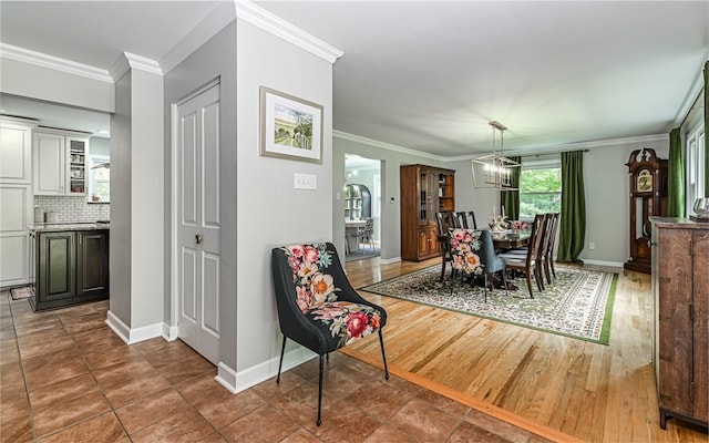 4077 Clarkland Ave, Hampton, PA 15101 - dining room featuring a chandelier and crown molding
