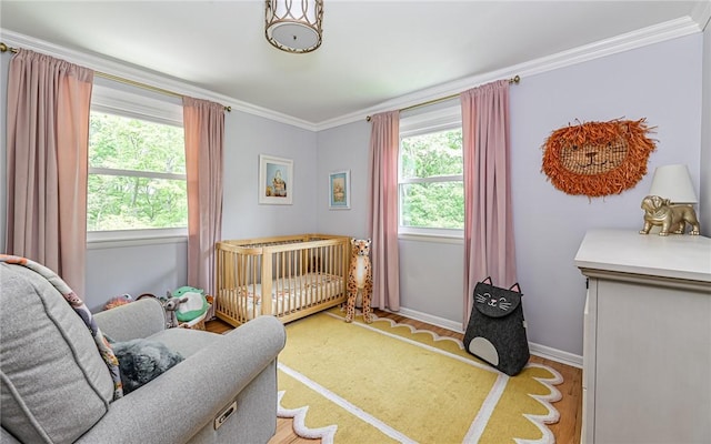 4077 Clarkland Ave, Hampton, PA 15101 - bedroom featuring crown molding and a crib