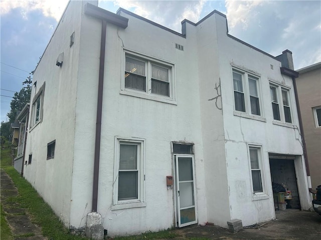 147 S 9th St, Connellsville, PA 15425 - view of front of home featuring stucco siding