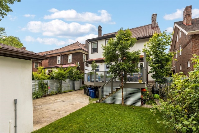 5508 Darlington Rd, Squirrel Hill, PA 15217 - rear view of property with a chimney, stairway, stucco siding, and a tile roof