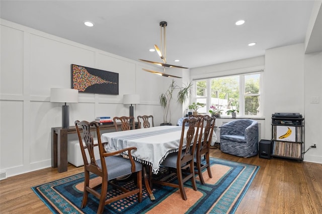 5508 Darlington Rd, Squirrel Hill, PA 15217 - dining area featuring a decorative wall, wood finished floors, and recessed lighting
