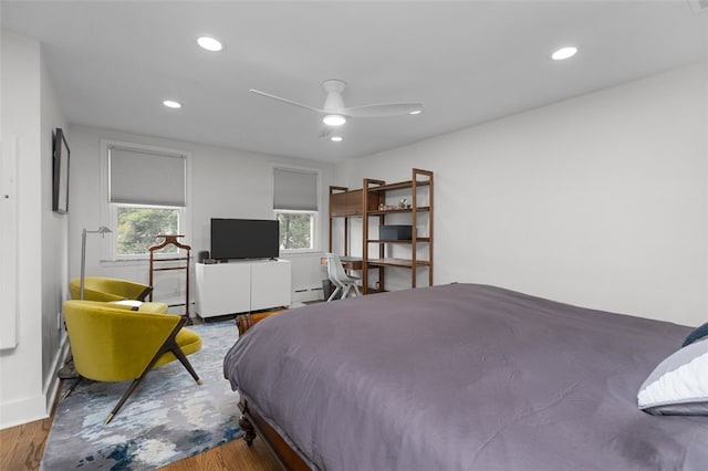 5508 Darlington Rd, Squirrel Hill, PA 15217 - bedroom featuring wood finished floors, recessed lighting, and a baseboard heating unit