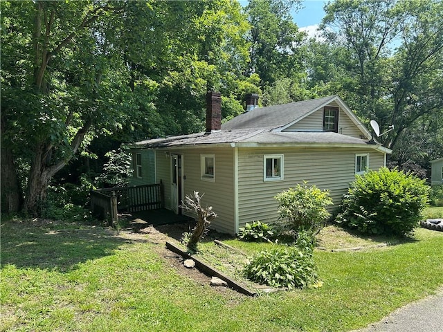 19 Wickhaven Hollow Rd, Perry Twp Fay, PA 15492 - view of property exterior with a yard and a chimney