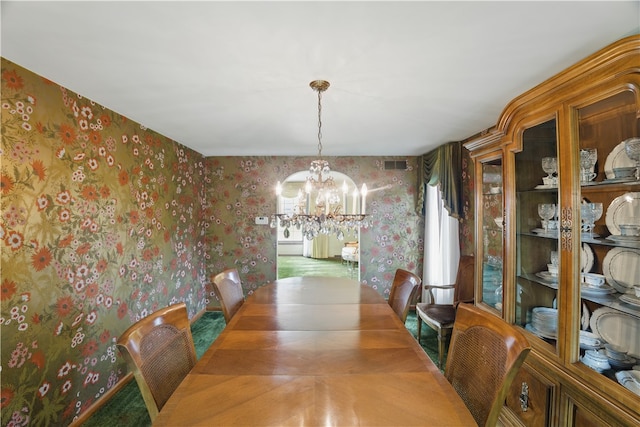 480 Herbst Manor Rd, Kennedy Twp, PA 15108 - dining area with wallpapered walls and a chandelier
