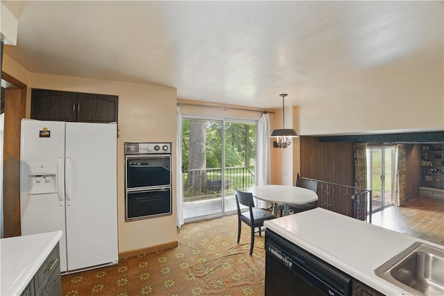 480 Herbst Manor Rd, Kennedy Twp, PA 15108 - kitchen with white fridge with ice dispenser, dishwasher, multiple ovens, light countertops, and hanging light fixtures