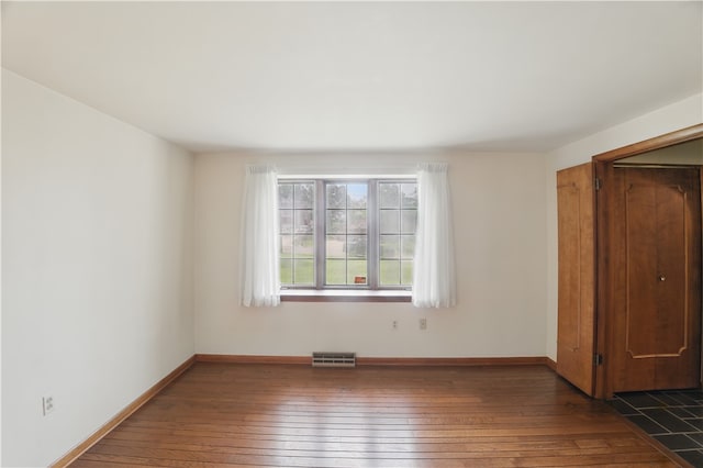 480 Herbst Manor Rd, Kennedy Twp, PA 15108 - unfurnished bedroom featuring dark wood-style flooring and baseboards