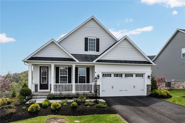 159 Heather Dr, North Strabane, PA 15317 - view of front of property with covered porch, a standing seam roof, asphalt driveway, and an attached garage