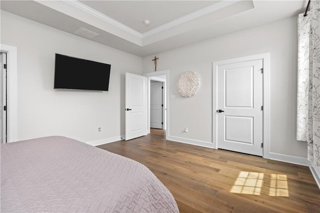 159 Heather Dr, North Strabane, PA 15317 - bedroom featuring wood finished floors, crown molding, and a tray ceiling