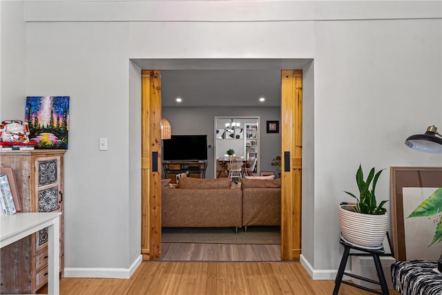 5719 Hobart St, Squirrel Hill, PA 15217 - hall with light wood-style floors, recessed lighting, and a chandelier
