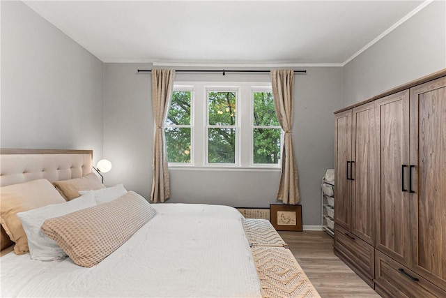 5719 Hobart St, Squirrel Hill, PA 15217 - bedroom with light wood-style floors and ornamental molding