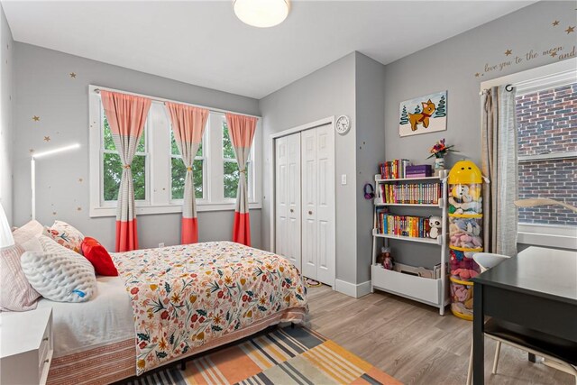 5719 Hobart St, Squirrel Hill, PA 15217 - bedroom featuring wood finished floors and a closet