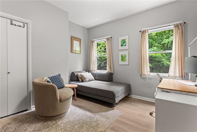 5719 Hobart St, Squirrel Hill, PA 15217 - living area featuring light wood-style flooring and baseboards