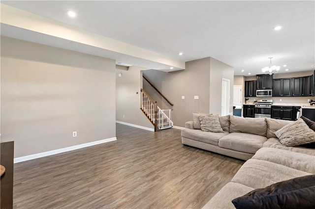159 Horseshoe Dr, North Fayette, PA 15071 - living area with a chandelier, stairs, wood finished floors, and recessed lighting