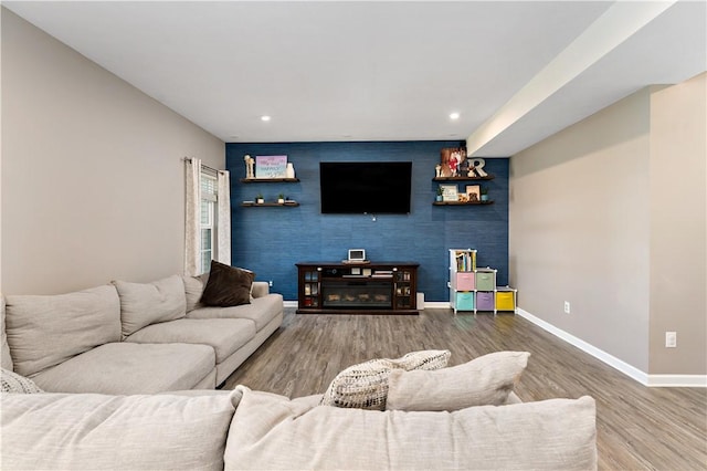 159 Horseshoe Dr, North Fayette, PA 15071 - living area with an accent wall, wood finished floors, and recessed lighting