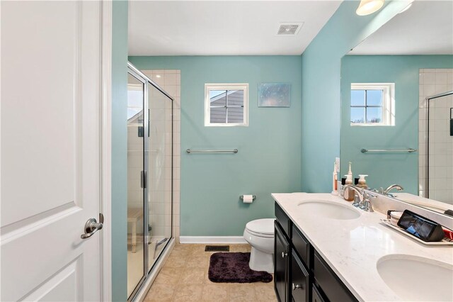 159 Horseshoe Dr, North Fayette, PA 15071 - bathroom featuring double vanity, a stall shower, and tile patterned floors
