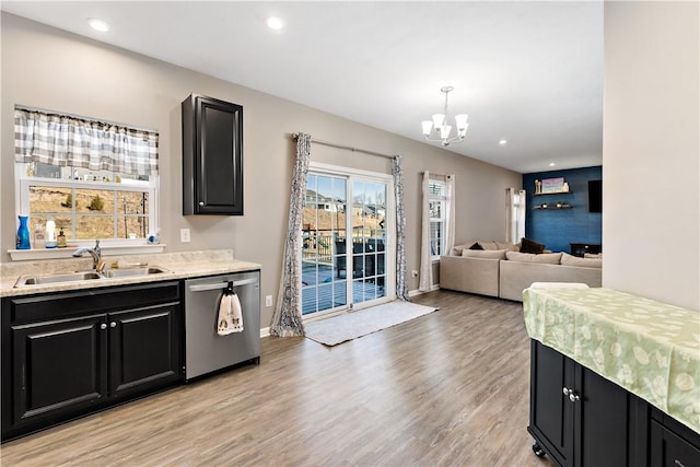159 Horseshoe Dr, North Fayette, PA 15071 - kitchen with dishwasher, dark cabinets, a chandelier, light countertops, and recessed lighting
