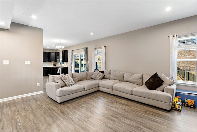159 Horseshoe Dr, North Fayette, PA 15071 - living area with a chandelier, light wood-type flooring, and recessed lighting
