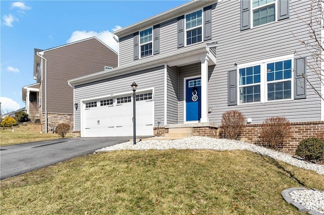 159 Horseshoe Dr, North Fayette, PA 15071 - view of front of property with asphalt driveway, a front yard, and a garage